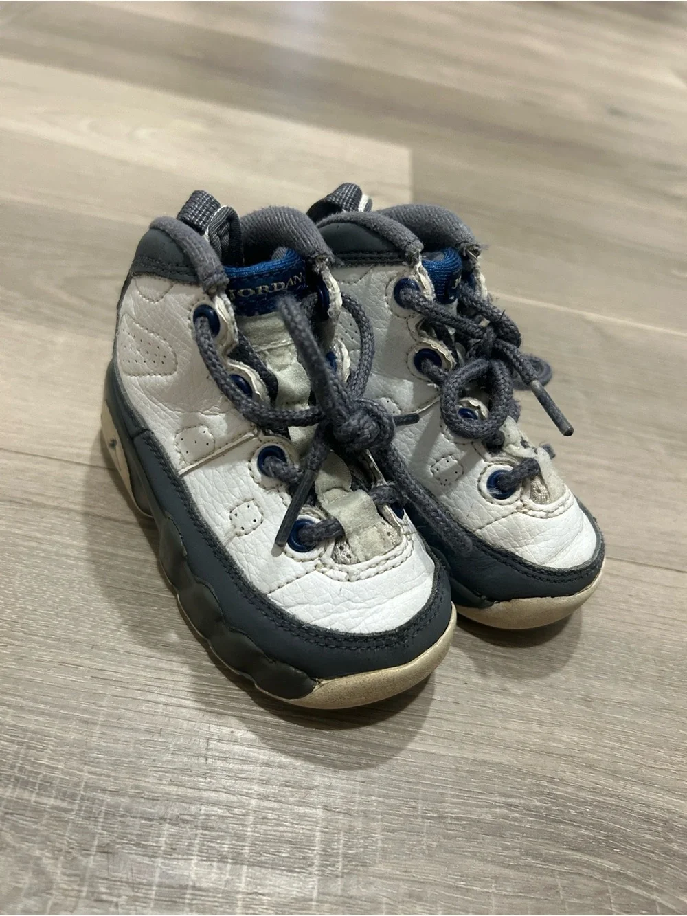 Jordan Kids White and Gray Retro Sneaker with Blue Eyelets